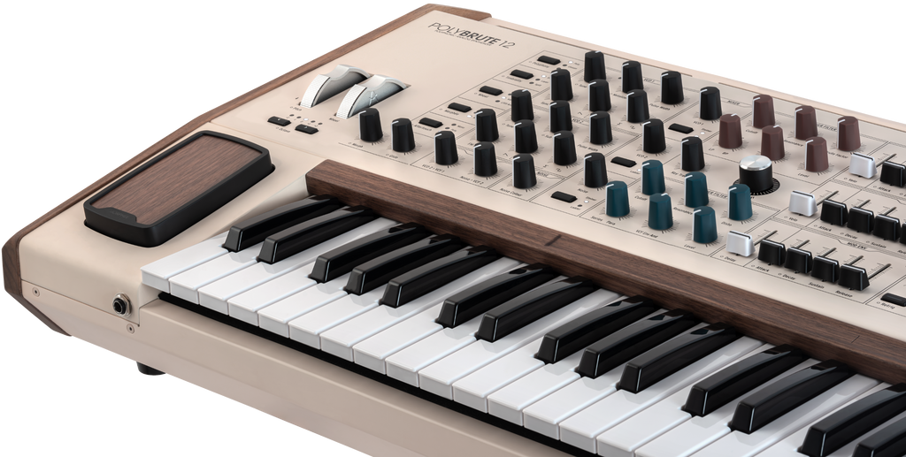 Arturia PolyBrute 12 synthesizer with keyboard and control panel, showcasing its detailed interface and 12-voice polyphony.