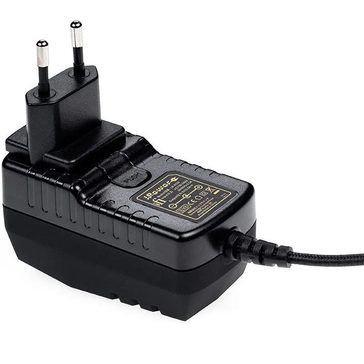 SilentPower iPower2 power supply unit with cooling fan and modular cables for PC builds, shown in black with multiple connection ports.