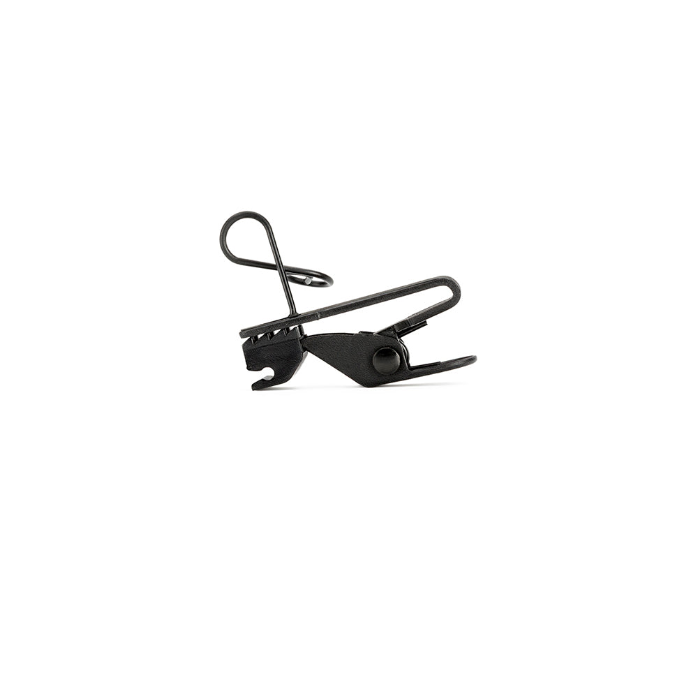 Rode RodeLink Lav Lavalier microphone clipped to a collar, wireless wearable microphone for clear audio recording.