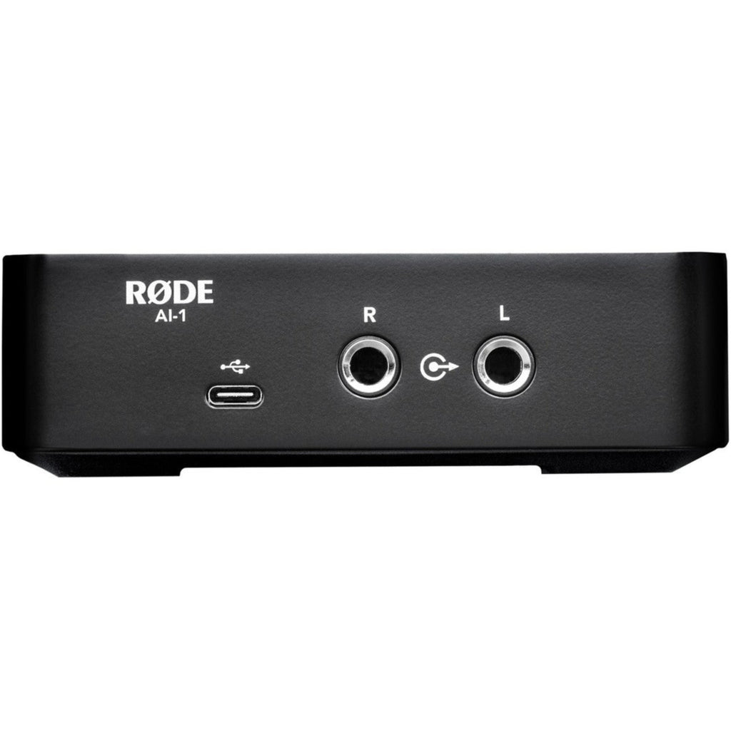 Rode AI-1 audio interface with sleek design, featuring input and output ports, used for professional audio recording and streaming.