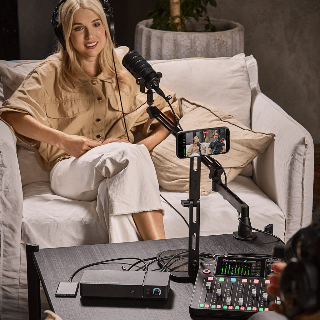 Rode RodeCaster Video Core controller for video editing, featuring multiple buttons and audio input ports on a compact device.