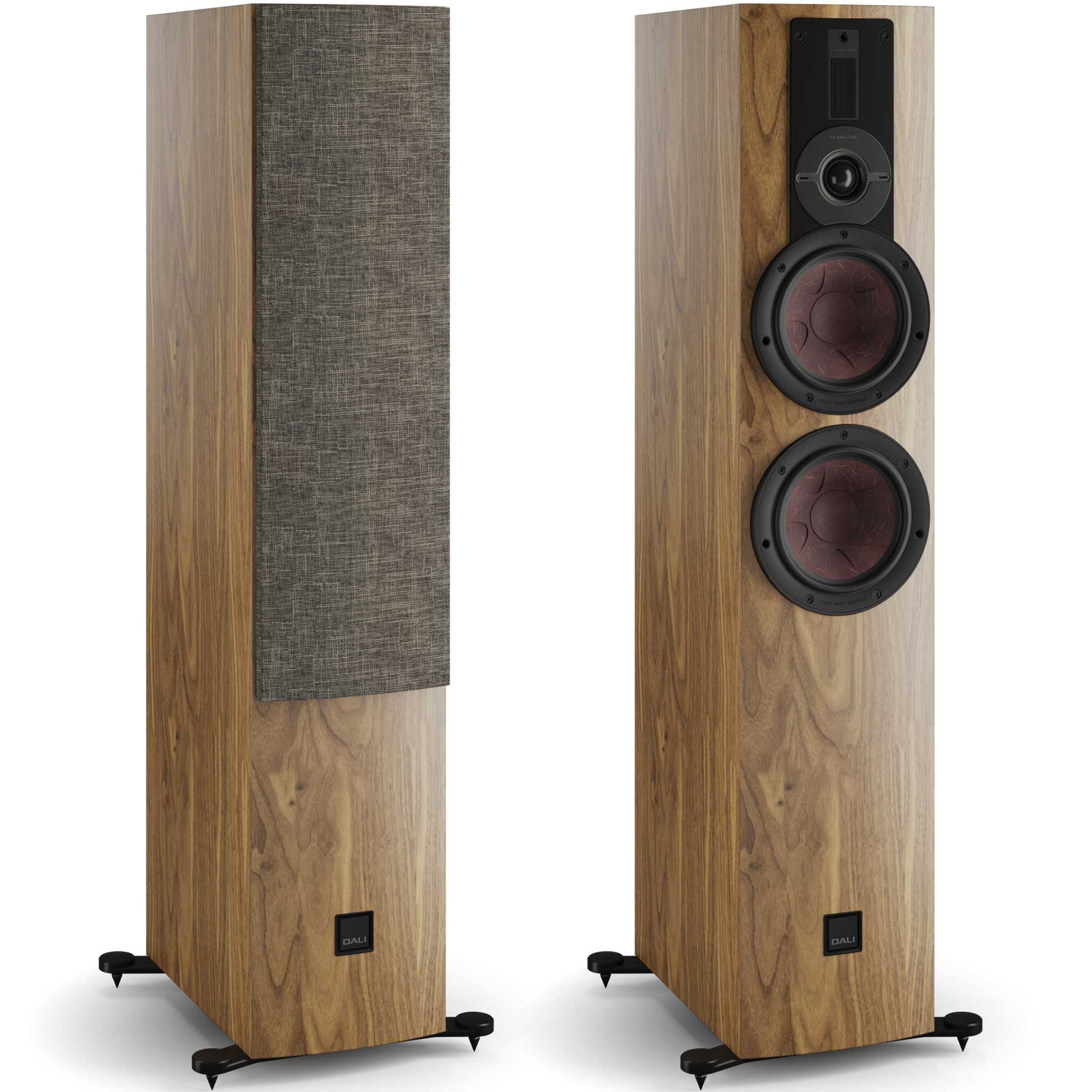 Pair of DALI Rubikore 6 passive floorstanding speakers in walnut finish, showcasing sleek design and wood grain texture.