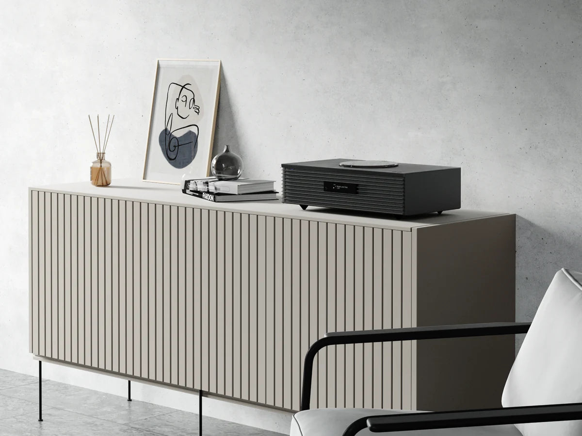 Technics SC-C70MK2 CD player with sleek black finish, digital display, and control buttons on top.