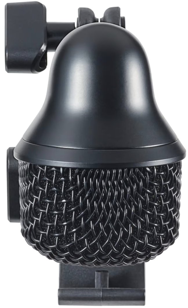 Shure Nexadyne 6 dynamic microphone with a black handle and grille, shown in a close-up image.