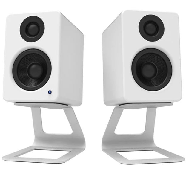 Kanto Audio SE2 speaker stands shown from the back, featuring a sleek black design and adjustable height for optimal audio setup.