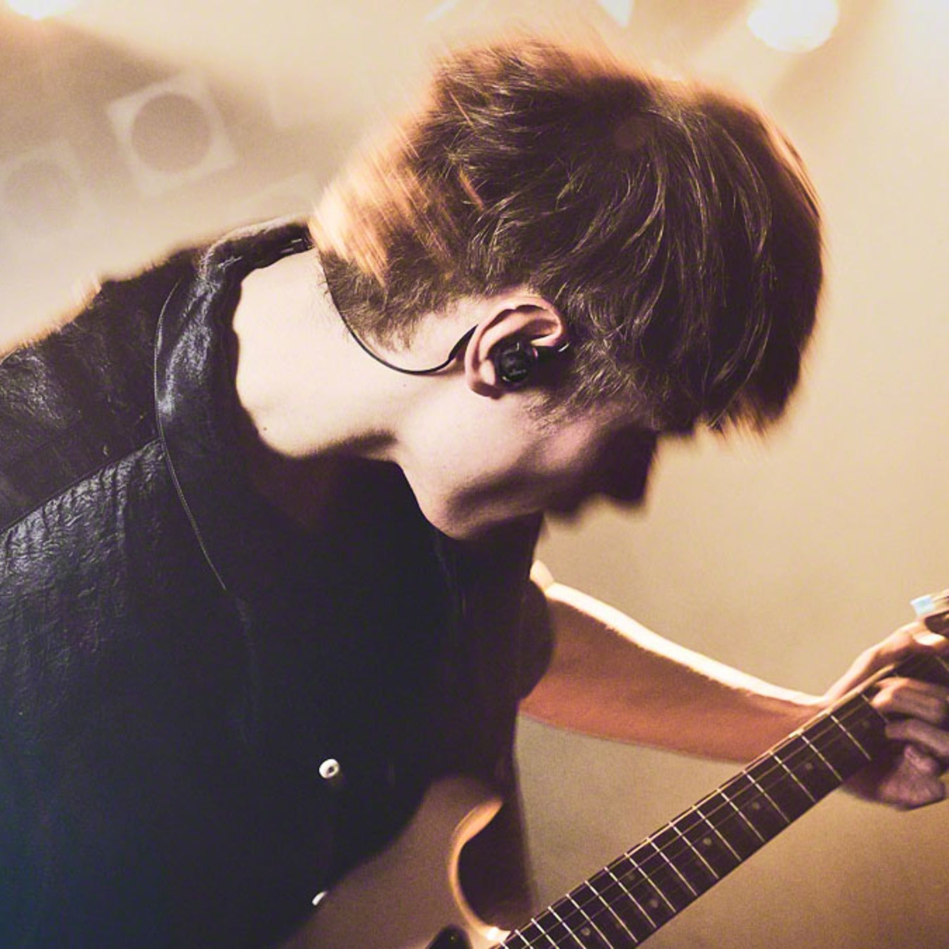 Sony IER-M500 worn by a guitarist on stage