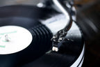 Sumiko Rainier MM phono stylus for turntables, shown in a close-up with detailed needle and cartridge components.