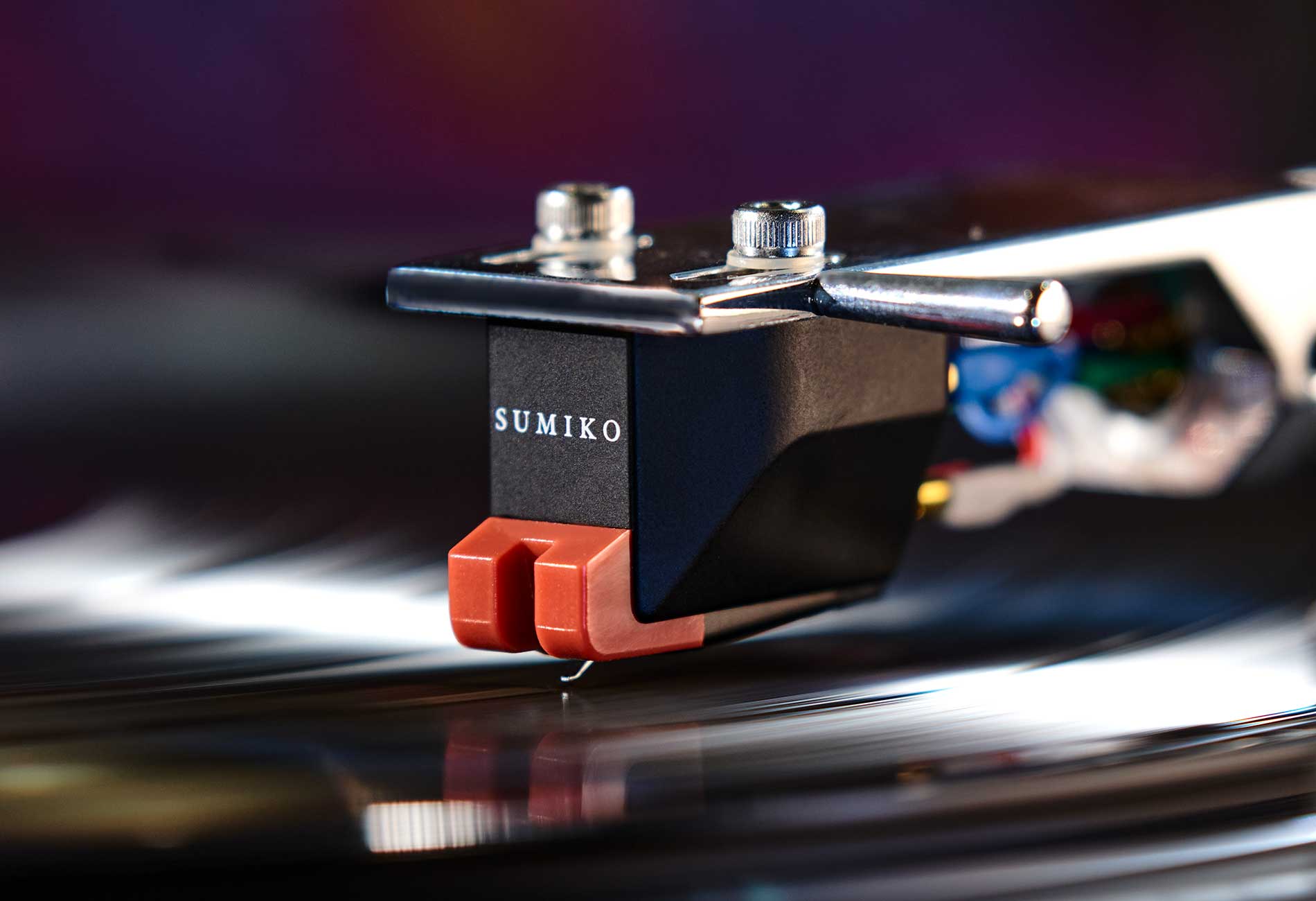 Sumiko Moonstone MM phono cartridge mounted on Technics 1200 turntable, showcasing the cartridge's design and stylus.