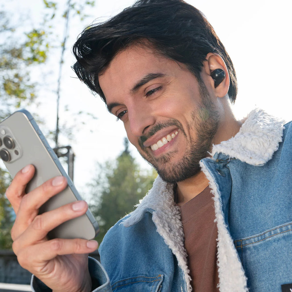 Technics EAH-AZ100 true wireless earbuds, in black, lifestyle setting