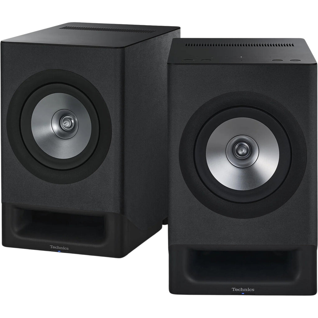 Technics SC-CX700 active bookshelf speakers with sleek black finish and modern design, showcasing their compact, stylish audio setup.