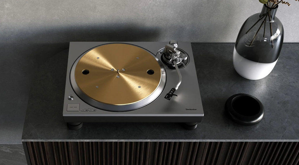 Technics SL-1300G turntable with sleek design, featuring tonearm and platter, ideal for high-quality vinyl playback and audio listening.