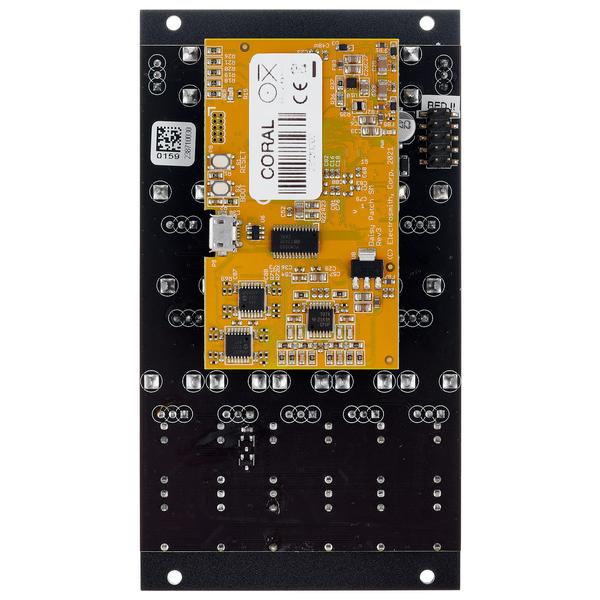 OXI Instruments Coral semi-modular synthesizer with colorful patch cables and control knobs, showcasing its modular design.