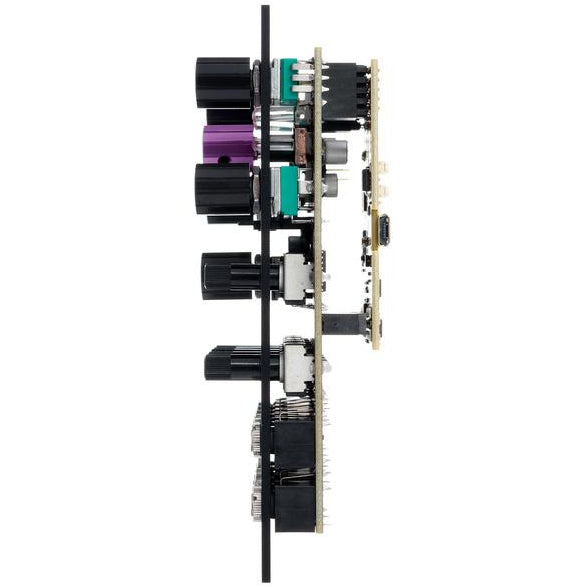OXI Instruments Coral semi-modular synthesizer with patch cables and control knobs, showcasing its colorful interface and modular design.