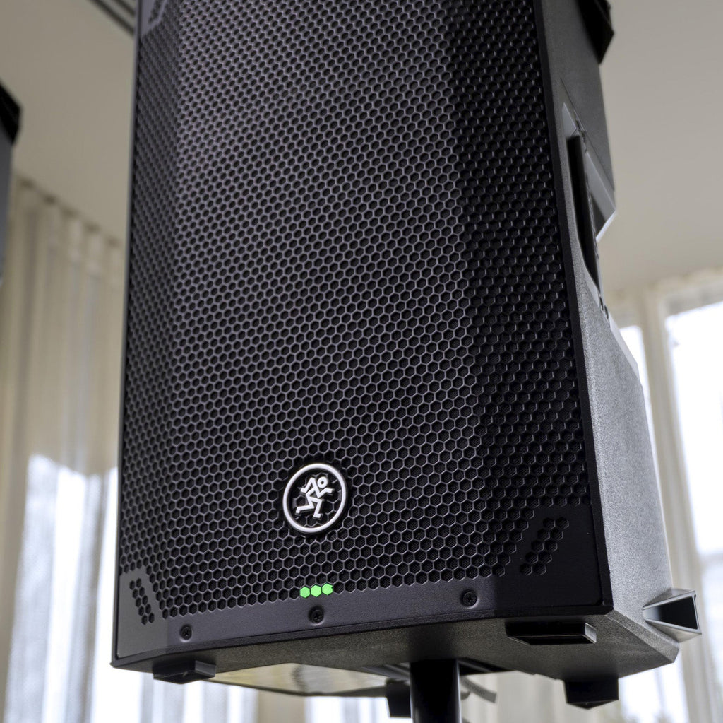 Mackie Thump12V4 active loudspeaker with a black speaker cabinet, front grille, and control panel on top.