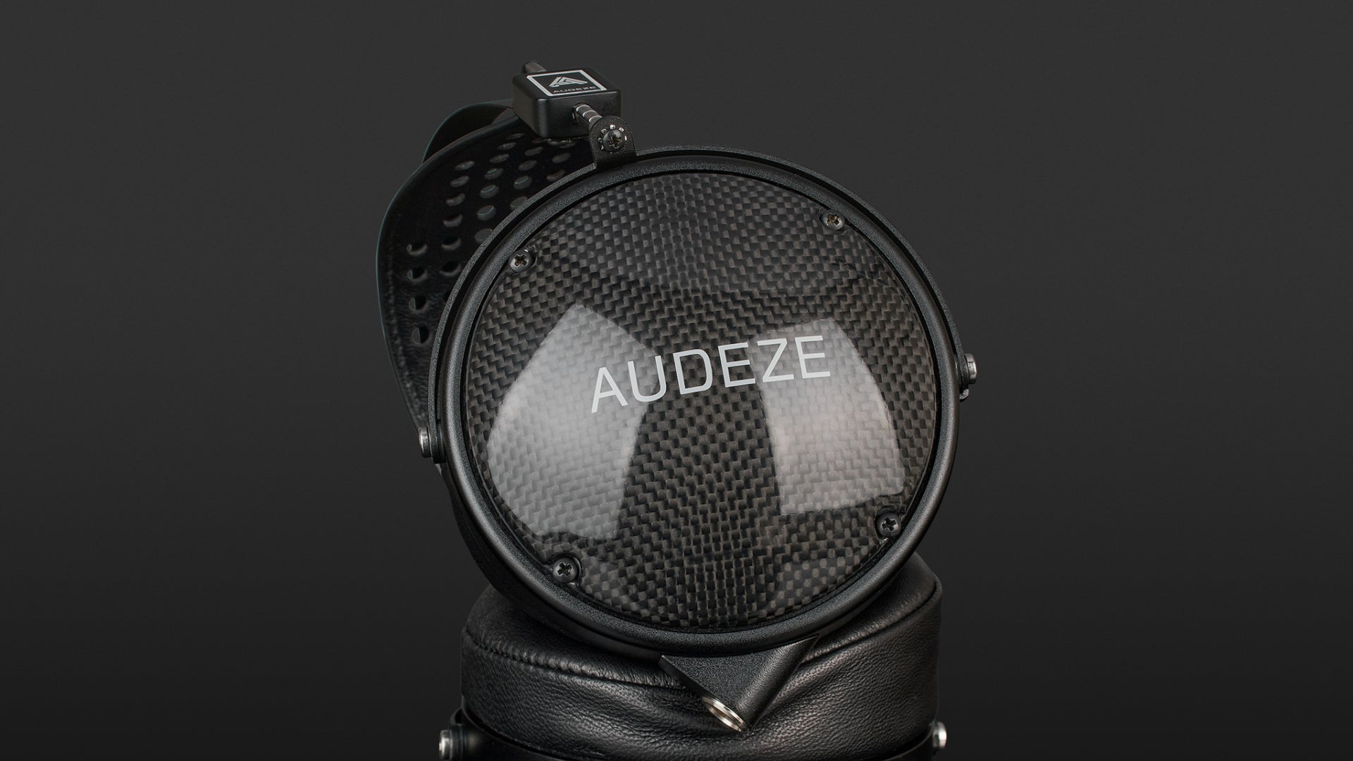Audeze LCD-XC Creator Package studio headphones with leather-free ear cushions, black and silver design for professional audio use.