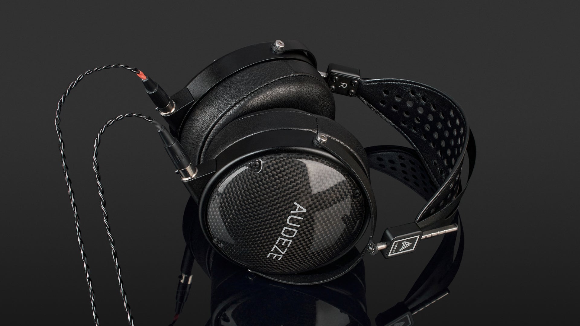 Audeze LCD-XC Creator Package studio headphones with leather-free ear cushions, black and silver design, on a neutral background.