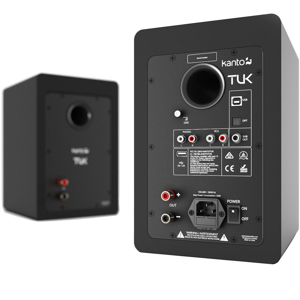 Kanto Audio TUK wireless speaker with black finish, compact design, and control buttons on top.