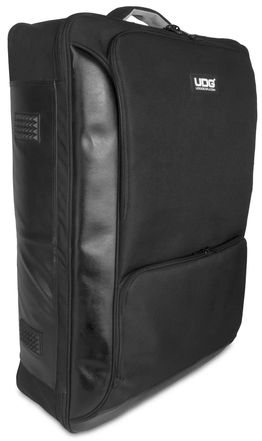 Black UDG Urbanite MIDI Controller Backpack with multiple compartments and padded straps for DJs and electronic music equipment.