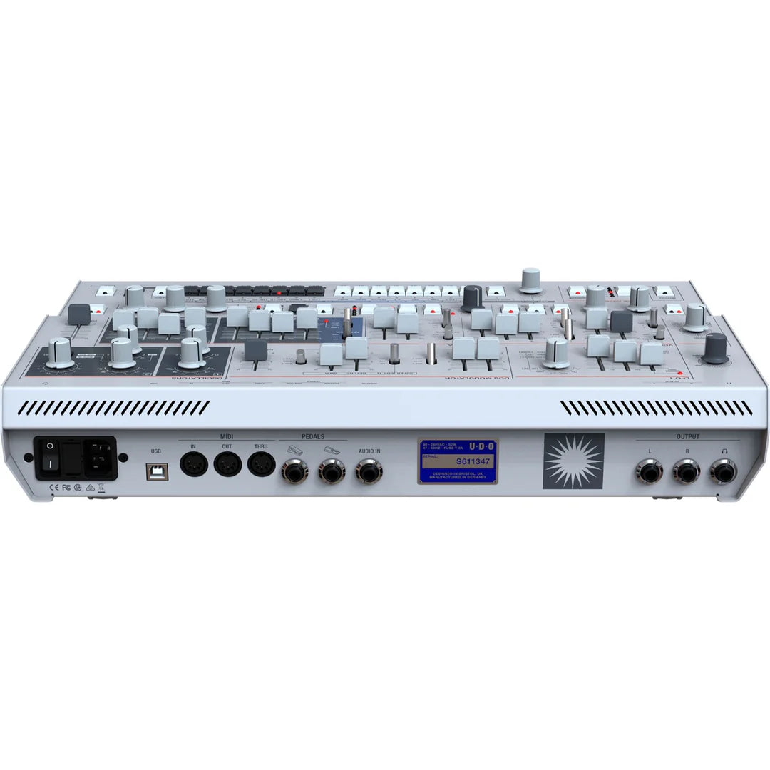 Rear top view of the UDO Audio Super 6 Desktop synthesizer showing control knobs and connection ports.