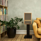 Vestlyd M-Stands holding a Vestlyd M8C Active in Oak in a living room