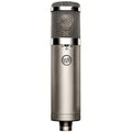 Warm Audio WA-47jr FET condenser microphone shown with silver body and vintage-style grille for studio recording.
