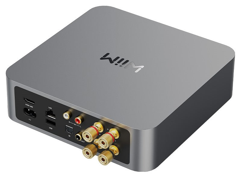 WiiM AMP music streamer device with sleek black design, featuring multiple ports and control buttons for high-quality audio streaming.