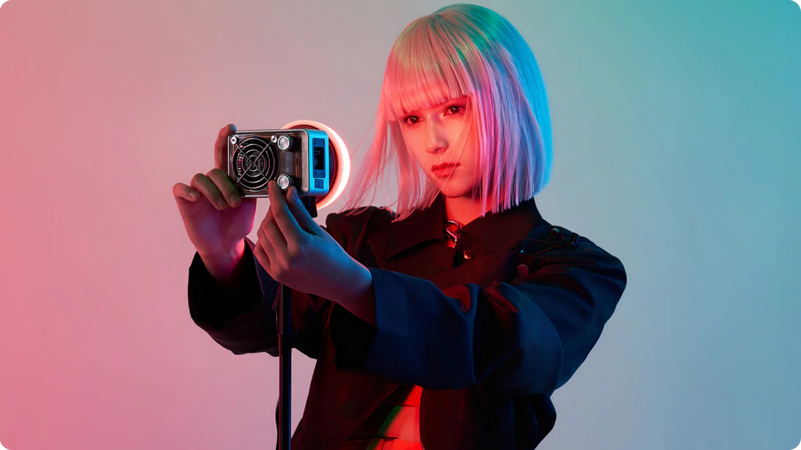 Zhiyun Molus X60 RGB Pro light showing adjustable color spectrum and bright LED panel for professional photography and videography.