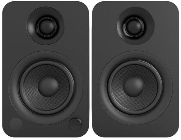 Kanto Audio YU wireless speakers with sleek black design, front view showing compact, modern audio system for high-quality sound.