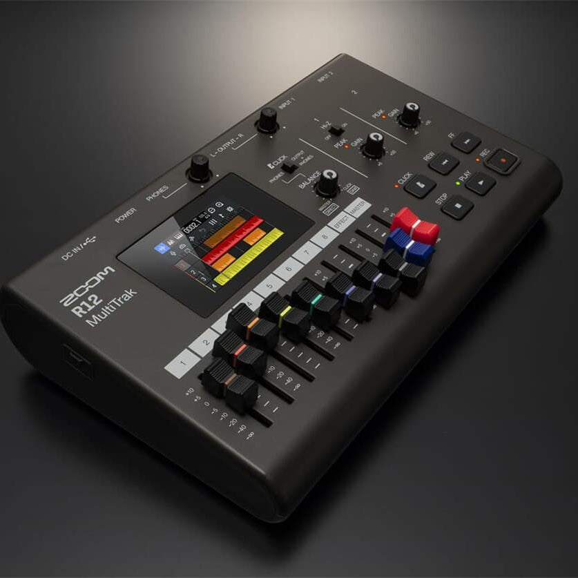 Zoom R12 digital recorder with multiple input options, LCD screen, and portable design for professional audio recording.